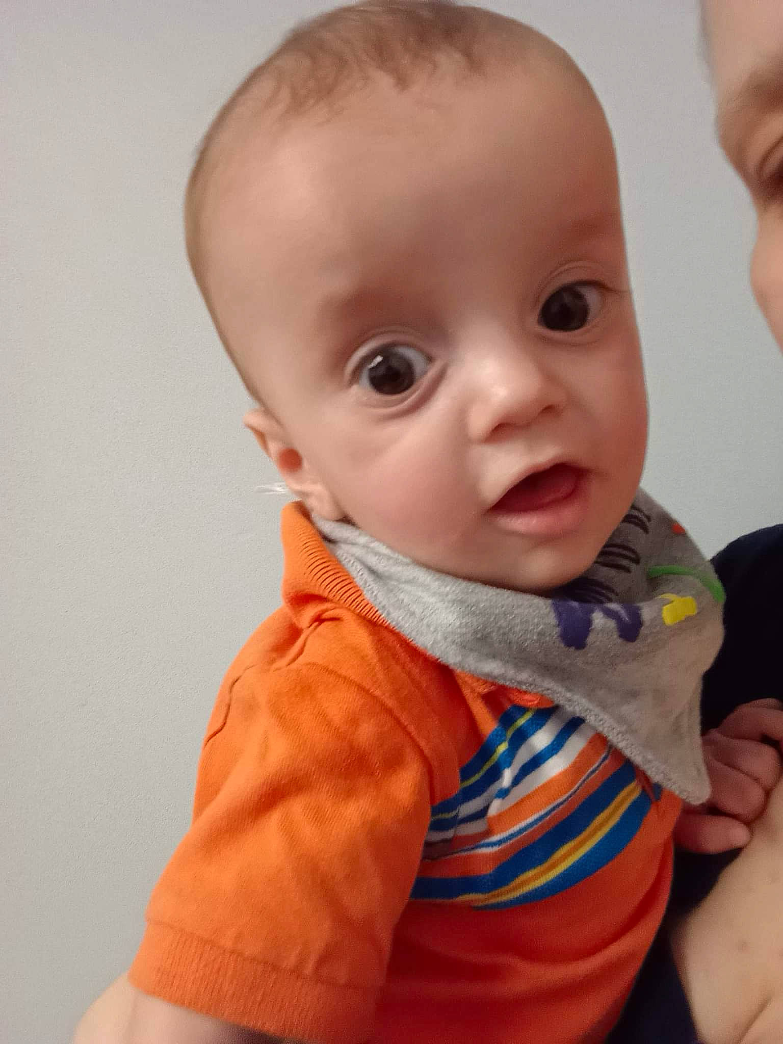 Maliki joined the competition — help win amazing prizes! baby, baby_toddler_clothing, cheek, child, collar, comfort, eyebrow, fun, happy, iris, lip, mouth, neck, nose, pattern, person, sitting, skin, sleeve, surprise