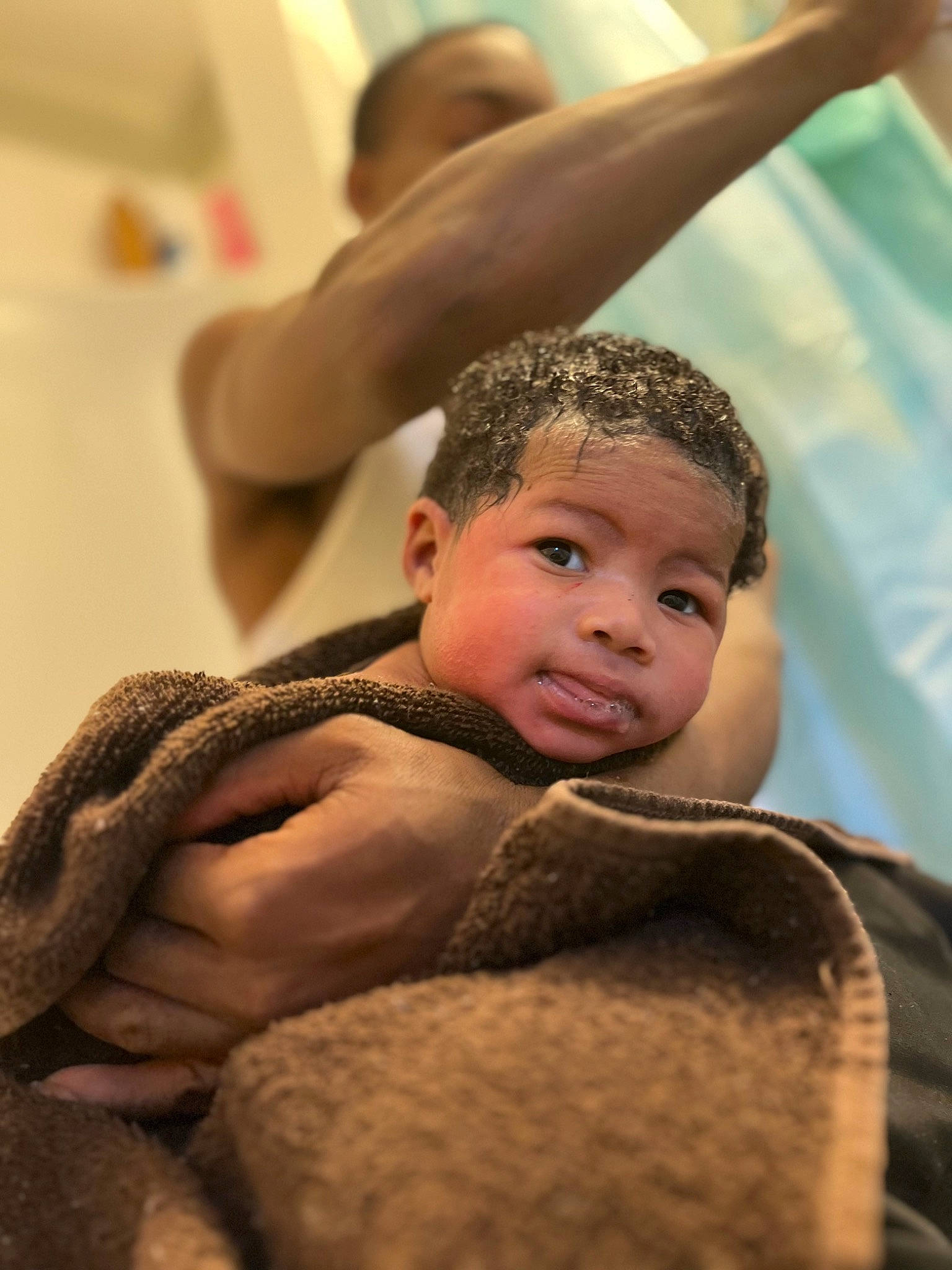 Kartier is registered to the contest to win money with this photo: baby, bathing, cheek, child, comfort, eyelash, flash_photography, fun, fur, gesture, happy, leisure, person, room, sitting, toddler