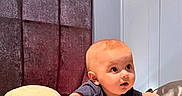 Kye joined the competition — help win amazing prizes! baby, infant, plush, pillow, curious, indoor, child, soft_toy, cushion, face, expression, person, toddler, bedroom, furniture, blanket, head, clothing, young_child, cute