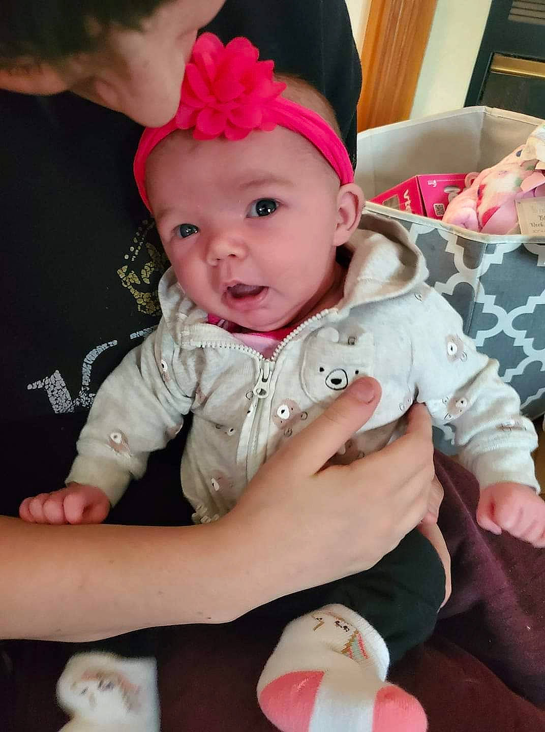 Deanna is registered to the contest to win money with this photo: baby, baby_products, baby_toddler_clothing, child, hair_accessory, headband, headgear, headwear, person, pink, play, toddler