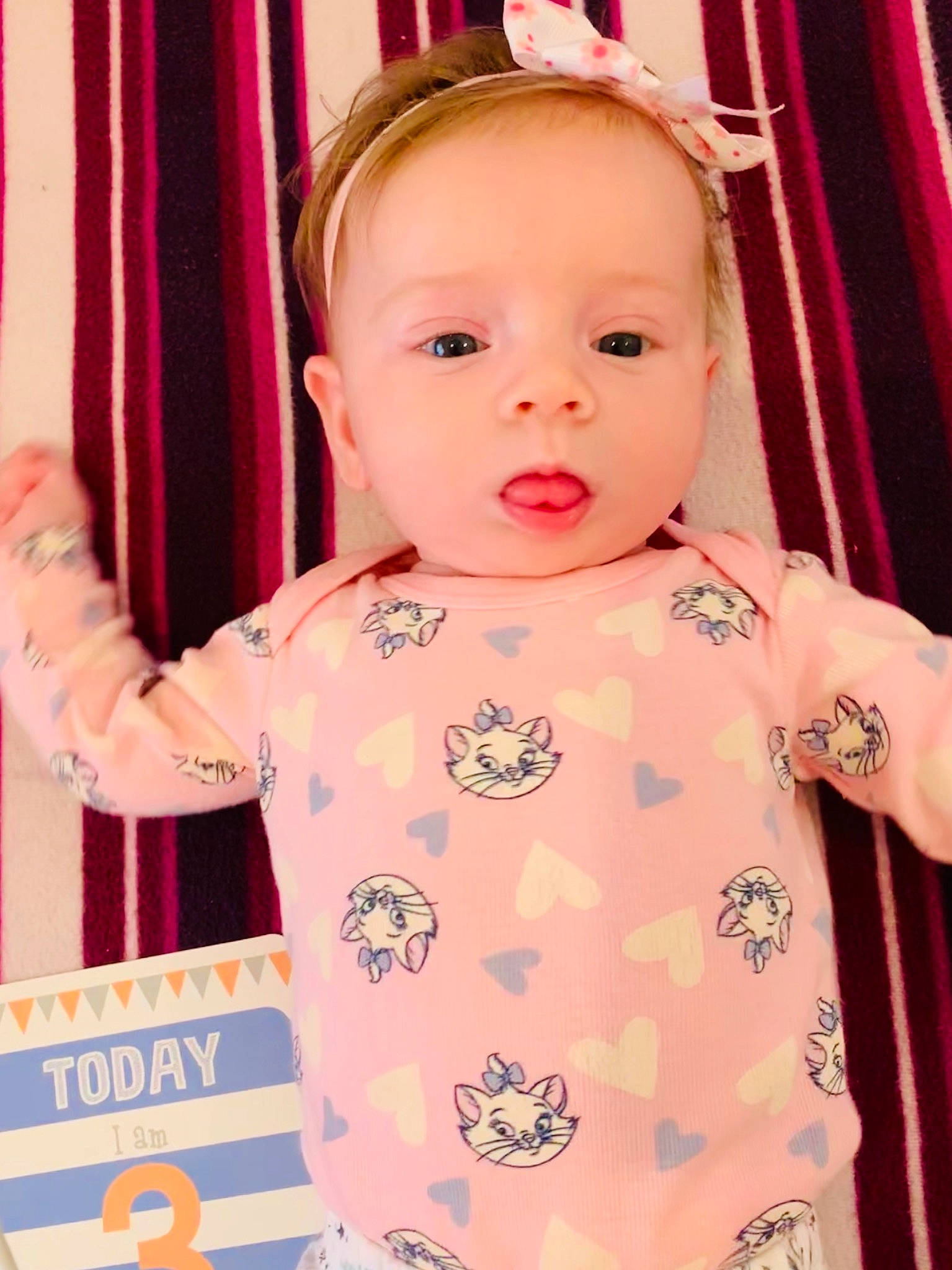 Meghan is registered to the contest to win money with this photo: baby, beauty, cheek, child, child_model, daughter, dress, eye, face, head, lip, person, pink, product, skin, sleeve, smile, textile, toddler