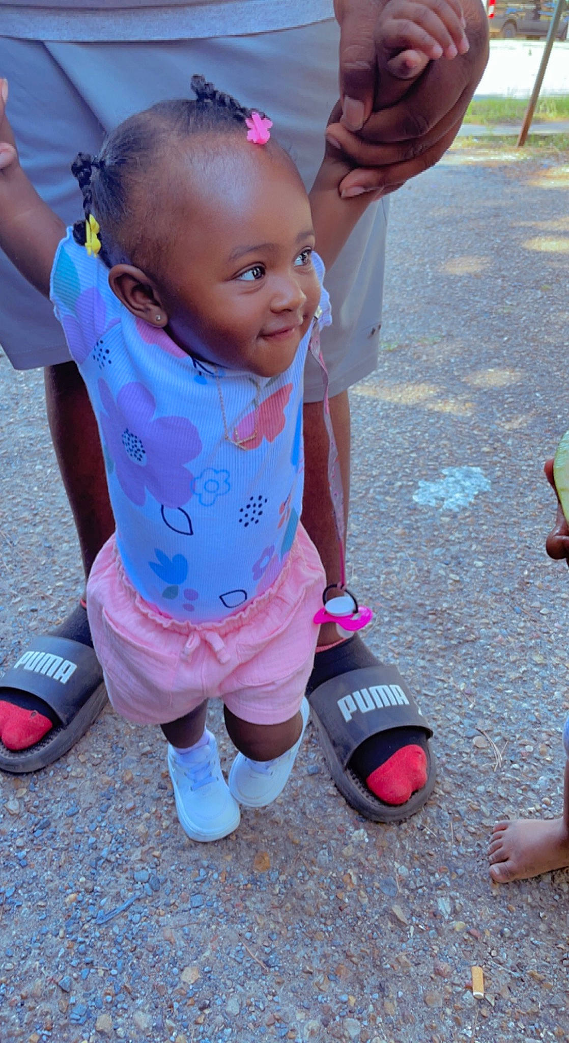 Kulture is registered to the contest to win money with this photo: baby_toddler_clothing, child, finger, fun, hand, happy, joint, knee, leisure, people, person, pink, purple, recreation, shoe, shorts, smile, sneakers, sock, thigh