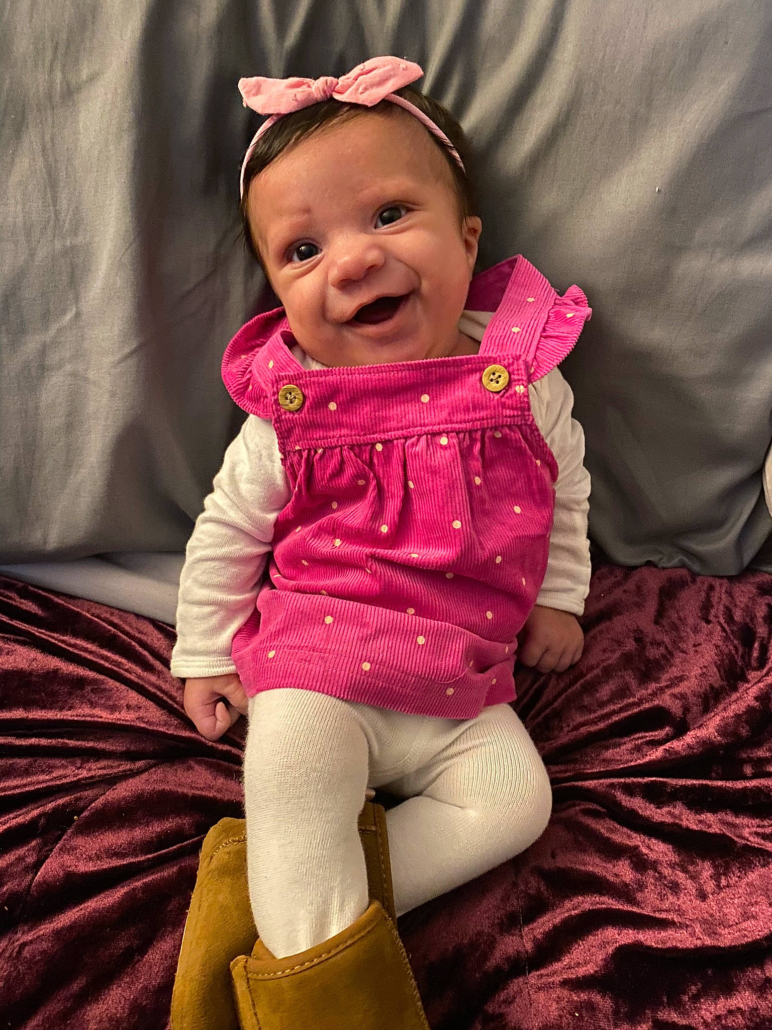 Novalee joined the competition — help win amazing prizes! baby, baby_toddler_clothing, comfort, face, happy, human_body, knee, lap, leg, lip, magenta, outerwear, person, pink, purple, sleeve, smile, sock, thigh, toddler