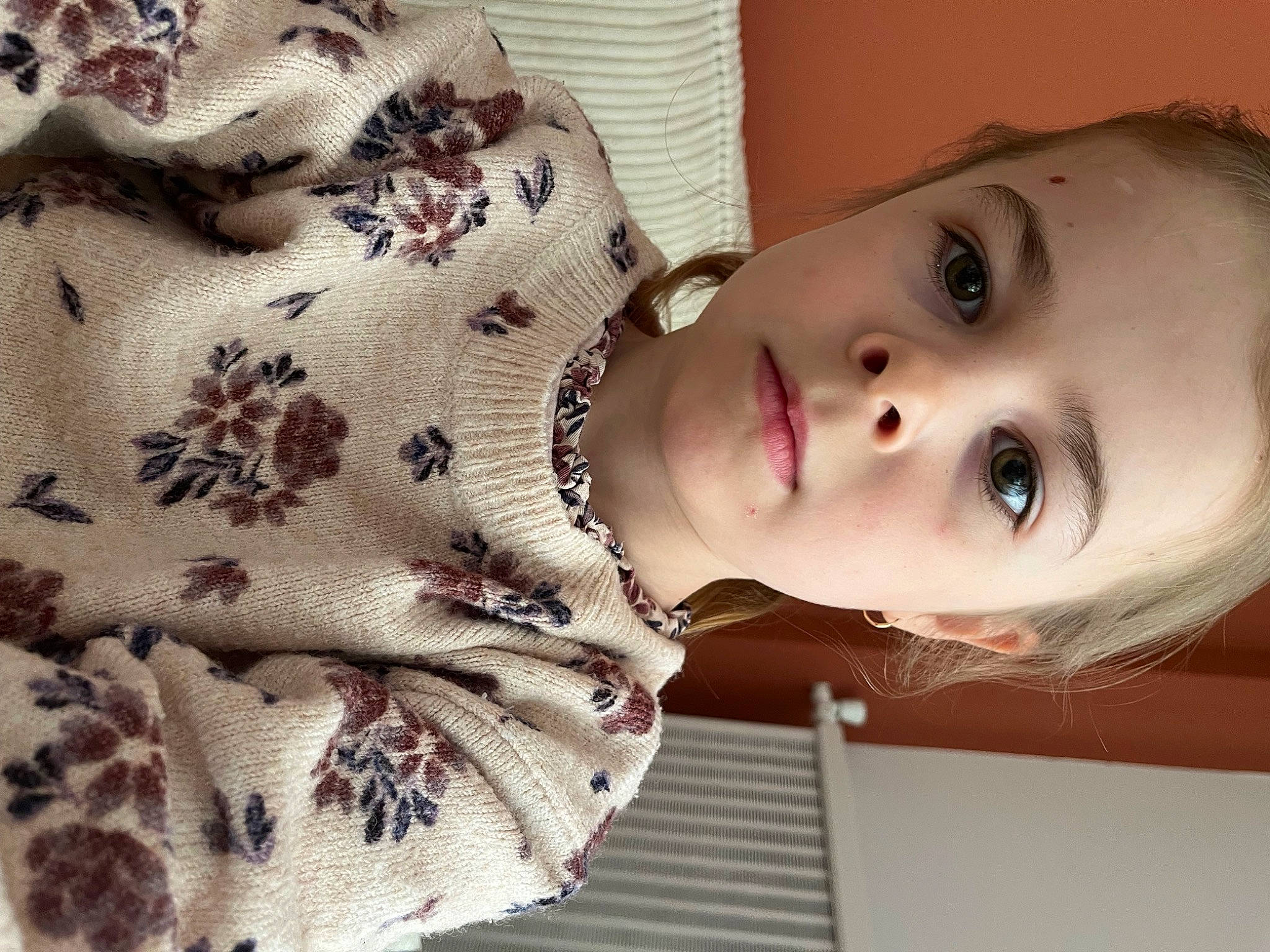 Camélia participe au concours pour gagner de l'argent avec cette photo : cheek, chest, child, dress, eyelash, face, jaw, linens, lip, mammal, neck, nose, pattern, person, plant, portrait_photography, room, skin, sleeve, toddler