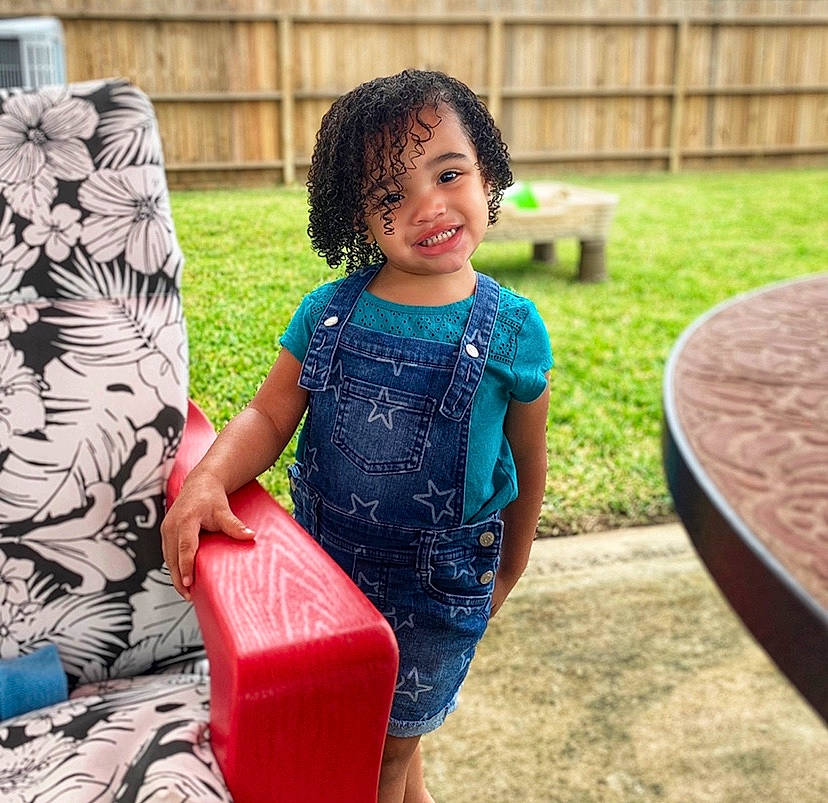 Aubriana is registered to the contest to win money with this photo: child, fun, happy, jeans, joy, people, person, plant, play, sitting, smile, style, summer, toddler, vacation