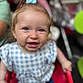 Lolah joined the competition — help win amazing prizes! baby, child, blue_eyes, bow, checkered_clothing, cute, face, happy, infant, person, red_stroller, sitting, small_child, smiling, toddler, young_child, indoor, close_up, casual_clothing, hair_accessory
