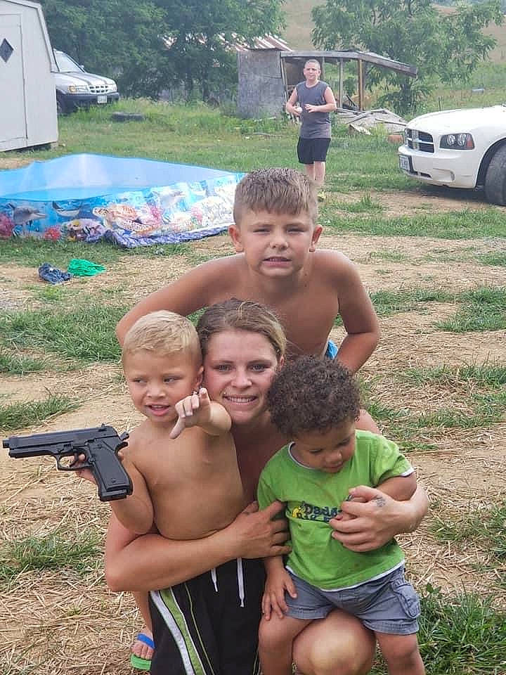 Easton is registered to the contest to win money with this photo: arm, blurred, community, fun, grass, grass_family, happy, joy, leisure, muscle, nature, person, photograph, plant, recreation, shorts, smile, summer, t_shirt, tent