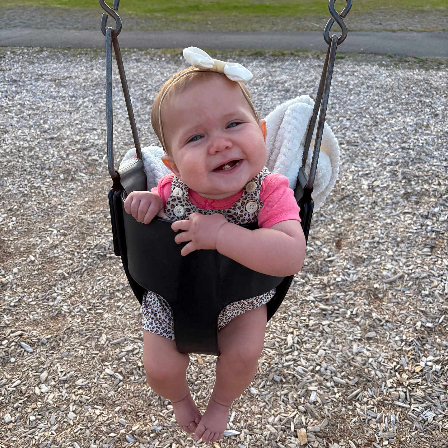 Harlow is registered to the contest to win money with this photo: baby, backyard, clothing, face, grass, hat, head, nature, outdoorplayarea, outdoors, park, person, photography, plant, playarea, portrait, soil, swing, toy, vegetation