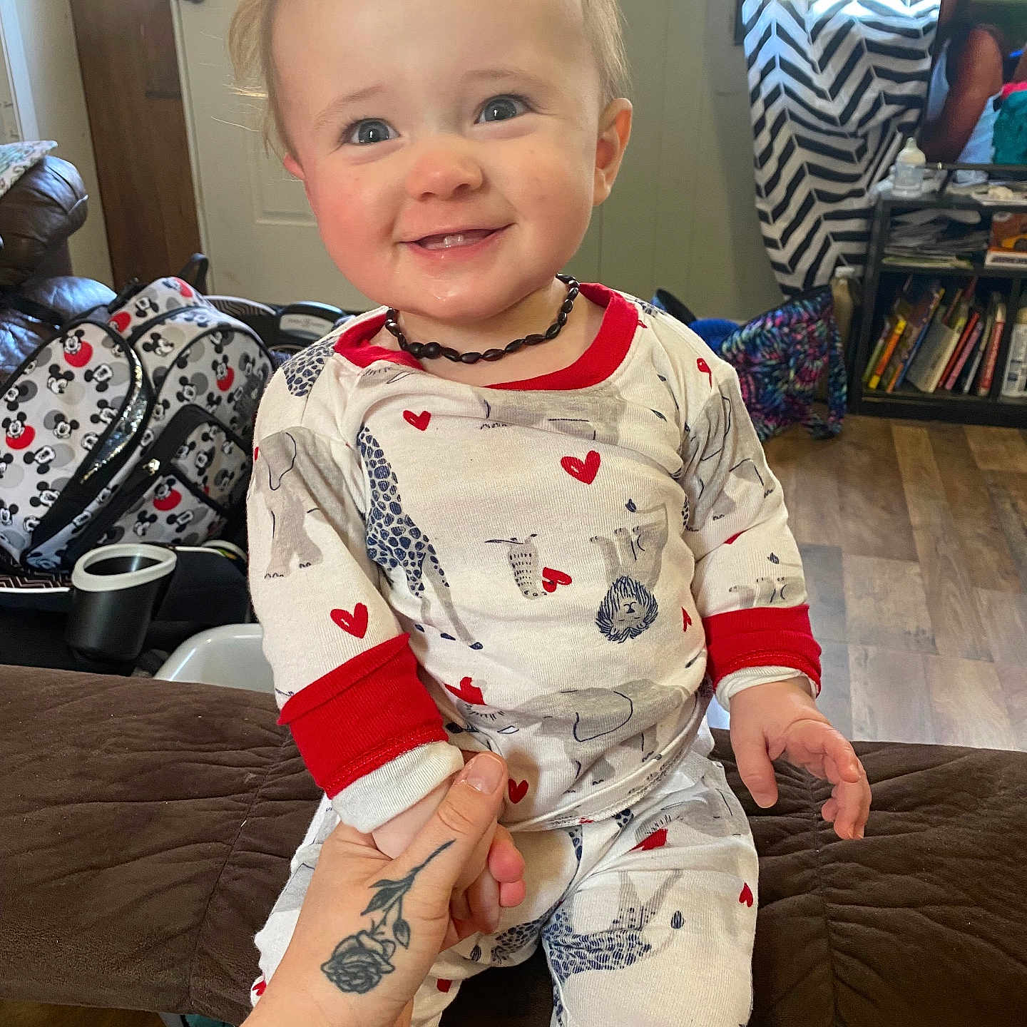 Connor joined the competition — help win amazing prizes! accessories, architecture, baby, building, clothing, couch, face, furniture, head, indoors, interiordesign, jewelry, livingroom, necklace, pajamas, person, photography, portrait, room, skin