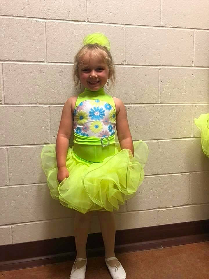 Lyllian is registered to the contest to win money with this photo: child, clothing, costume, dress, joy, person, t_shirt, toddler, yellow