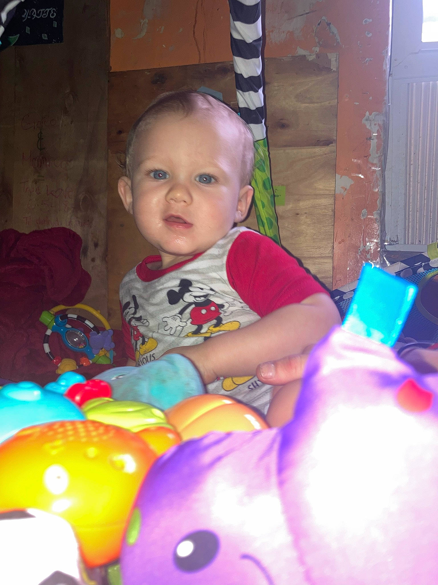 Wyatte is registered to the contest to win money with this photo: baby, baby_toddler_clothing, balloon, chair, child, event, eye, fun, happy, head, holiday, lap, leisure, magenta, party, party_supply, person, play, sitting, toddler