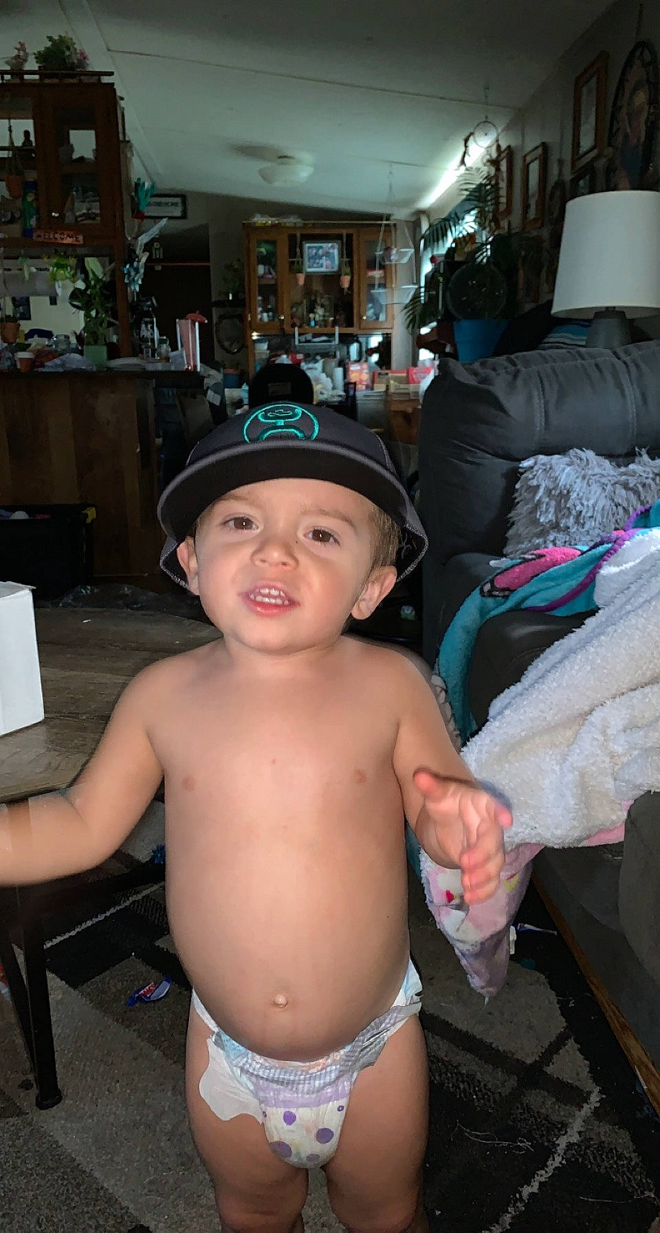 Hunter joined the competition — help win amazing prizes! abdomen, baby, barechested, baseball_cap, cap, chest, finger, fun, hat, headgear, headwear, human_body, human_leg, muscle, navel, person, smile, sun_hat, thigh, thumb