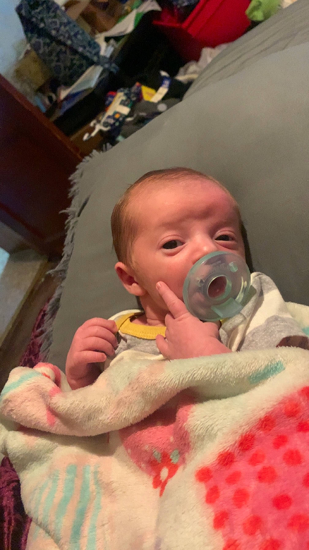 Daxton is registered to the contest to win money with this photo: baby, baby_products, baby_toddler_clothing, cheek, child, comfort, ear, eyebrow, eyelash, fun, iris, linens, lip, mouth, nail, nose, person, room, sitting, skin