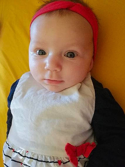 émyléa a rejoint le concours — aidez-le/la à gagner de superbes lots ! baby, baby_toddler_clothing, cap, cheek, child, costume_hat, dress, eyelash, face, fashion_accessory, hat, headgear, iris, lip, nose, outerwear, person, skin, sleeve, toddler