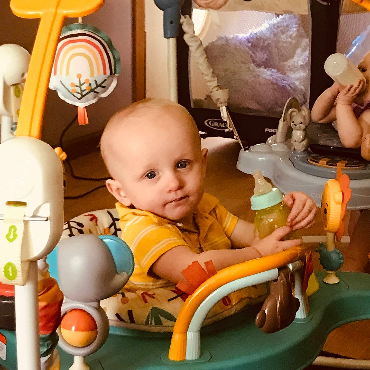 Kayden joined the competition — help win amazing prizes! baby, bodypart, crib, cushion, egg, face, finger, food, furniture, hand, head, homedecor, indoors, infantbed, person, photography, playarea, portrait, sitting, toy