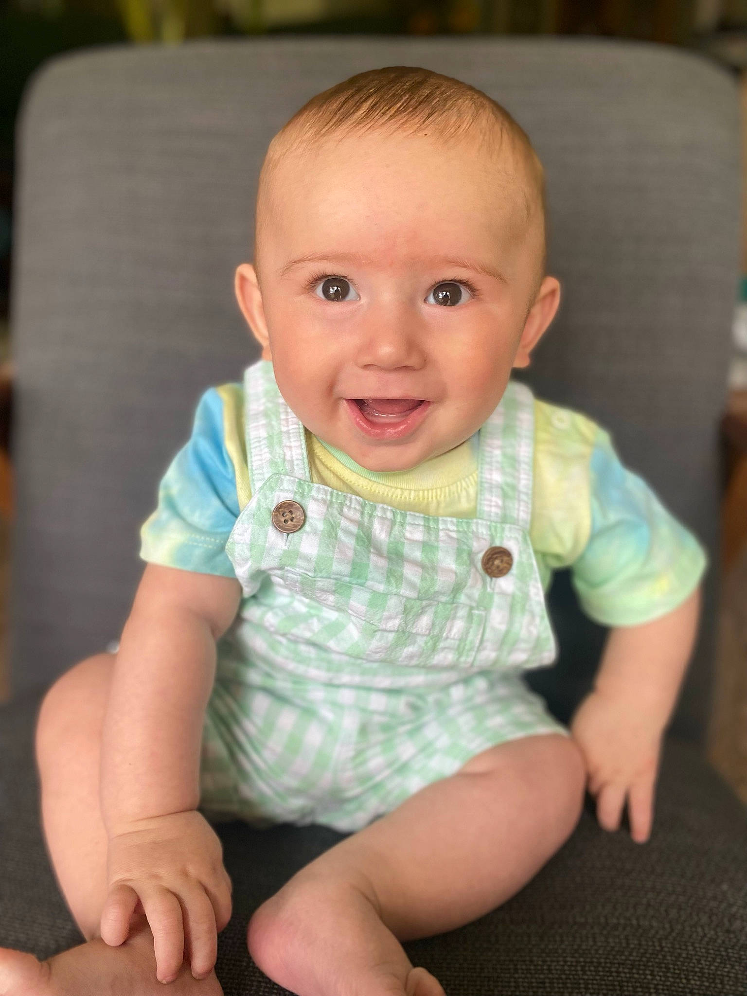 Joziah joined the competition — help win amazing prizes! baby, baby_toddler_clothing, cheek, child, comfort, eye, finger, flooring, hair, happy, human_body, iris, joy, lip, nose, person, sitting, skin, sleeve, smile