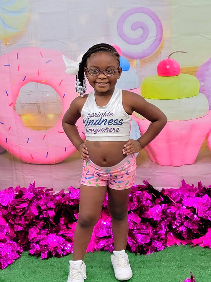 Noni joined the competition — help win amazing prizes! arm, beauty, brassiere, face, fun, grass, happy, human_leg, joy, leg, leisure, magenta, navel, person, petal, pink, plant, shorts, smile, summer