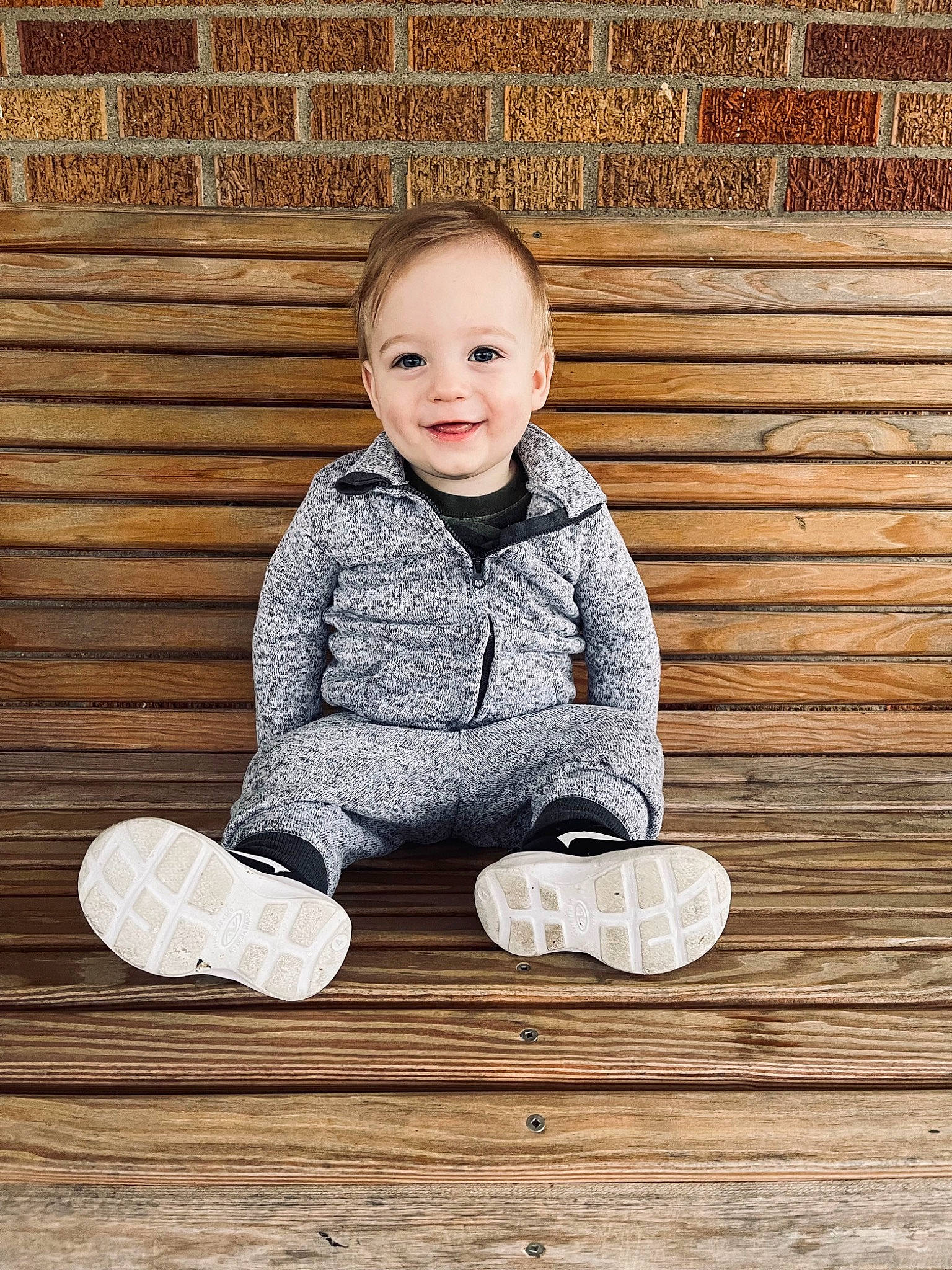 Luke is registered to the contest to win money with this photo: baby_toddler_clothing, beauty, cheek, child, clothing, face, facial_expression, flash_photography, floor, flooring, happy, hardwood, human_body, joy, person, product, shoe, sleeve, smile, standing