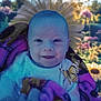 Bryson joined the competition — help win amazing prizes! baby, smiling, blanket, butterfly, flower, daisy, nature, portrait, child, outdoor, colorful, happy, flora, soft_focus, cute, infant, face, wrapped, garden, sunlight