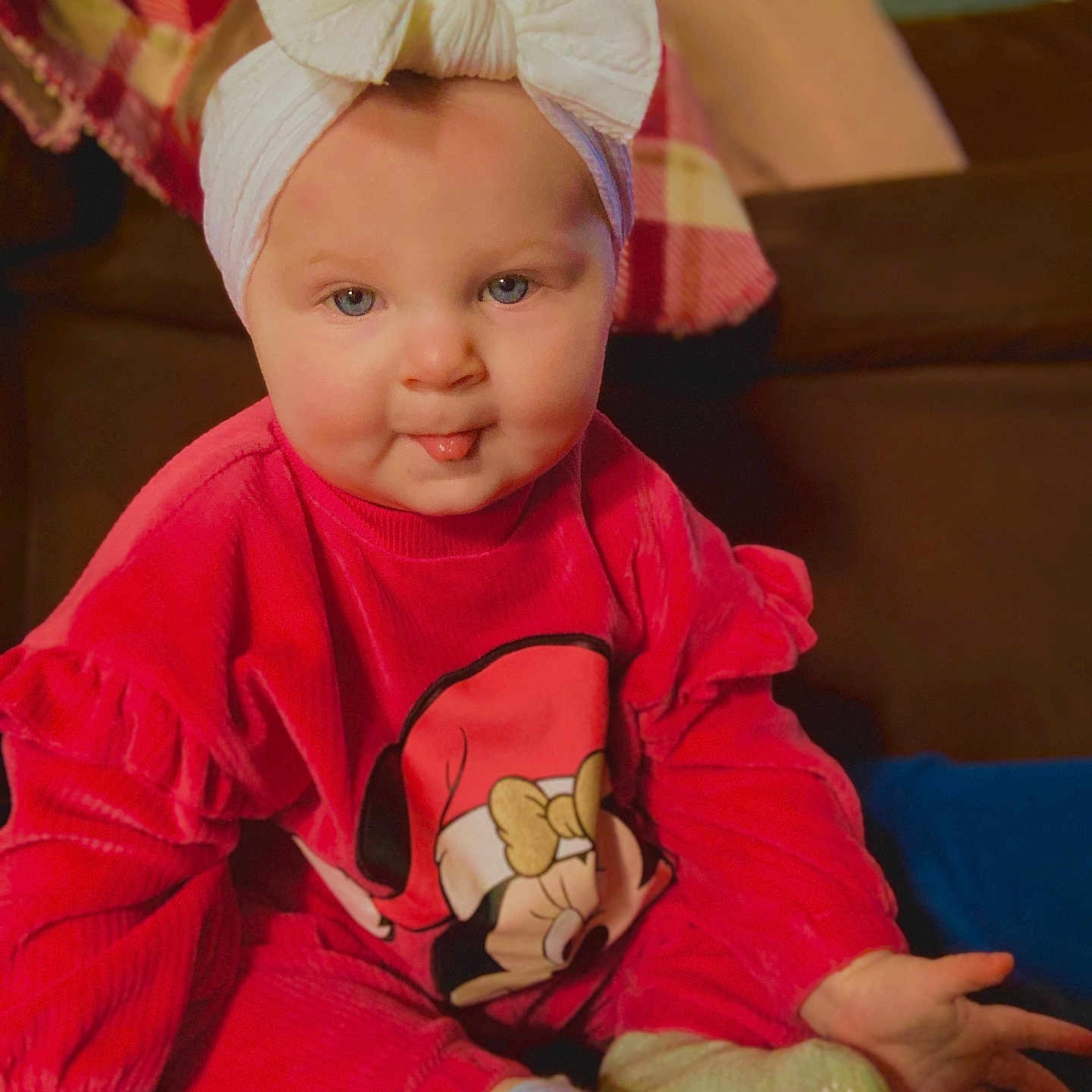 Sybil is registered to the contest to win money with this photo: architecture, baby, bodypart, building, clothing, couch, cushion, face, finger, furniture, hand, hat, head, homedecor, indoors, livingroom, person, photography, portrait, room