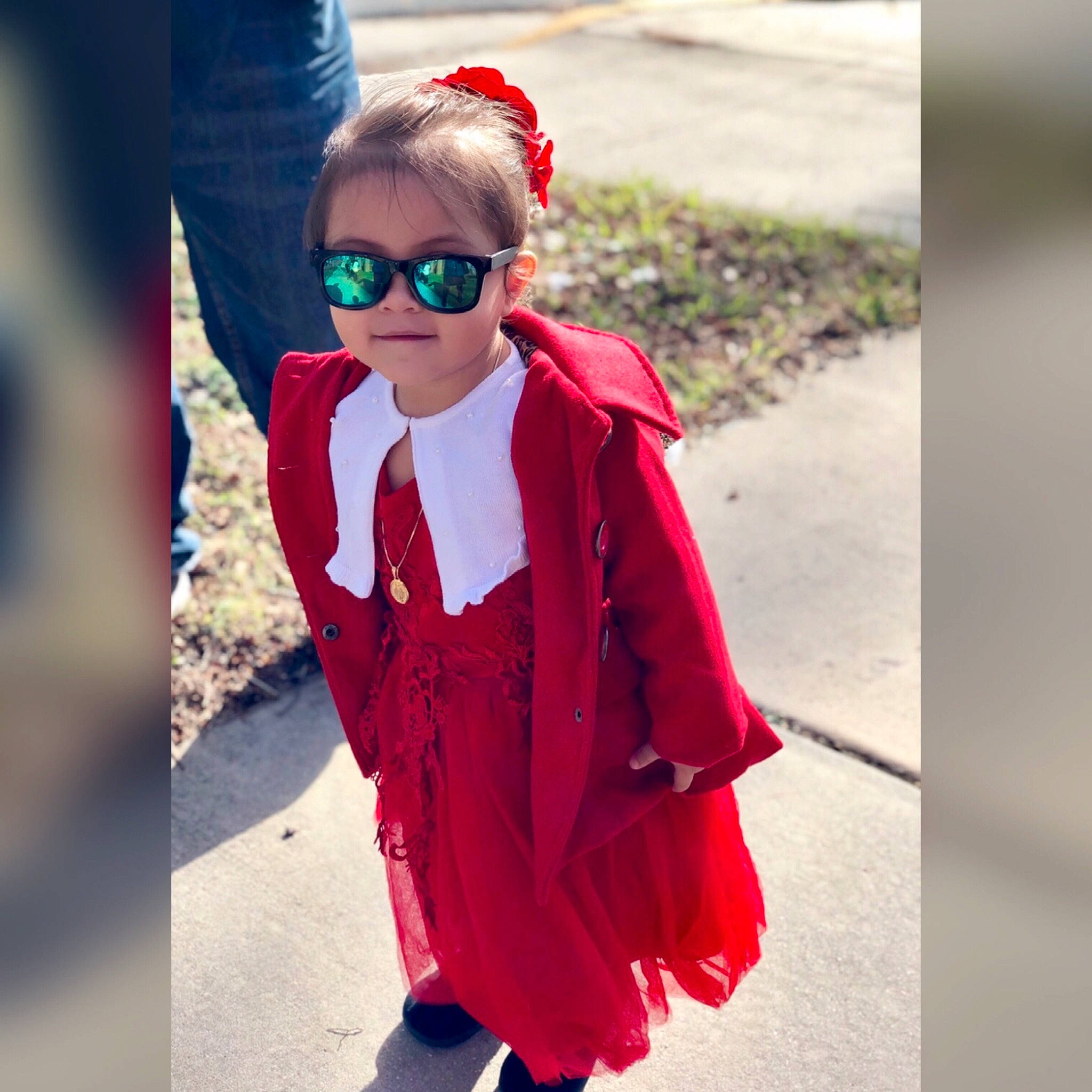 Lily Rose is registered to the contest to win money with this photo: child, clothing, coat, cool, costume, dress, eyewear, fashion, footwear, glasses, headgear, jacket, outerwear, red, shoulder, sleeve, street_fashion, sunglasses, textile, toddler