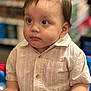 toddler, child, shopping_cart, curious, portrait, indoor, clothing, striped_shirt, hands, face, eyes, short_sleeves, person, young_child, cute, baby, expression, focus, casual, gaze