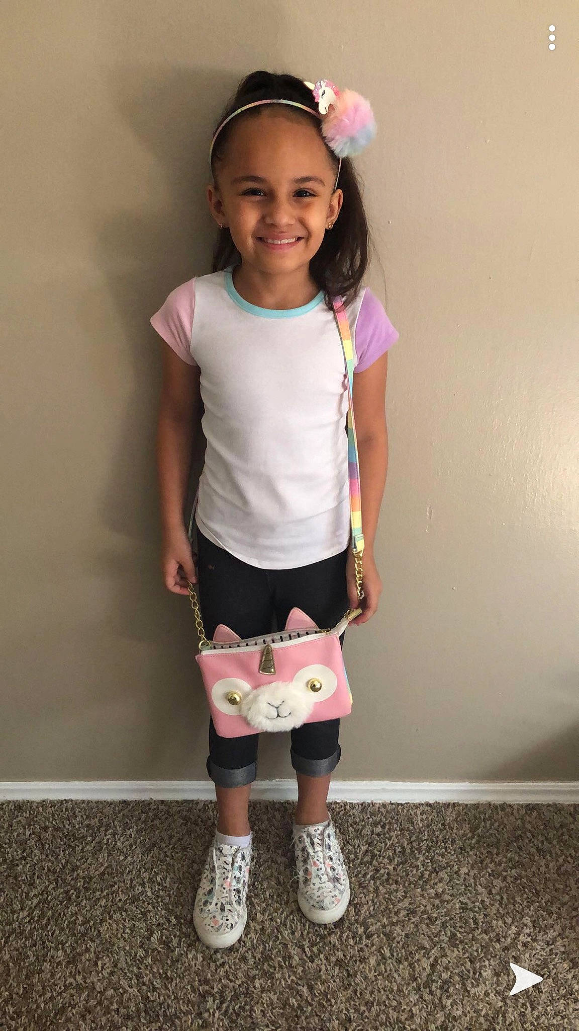 Anaya is registered to the contest to win money with this photo: arm, baby_toddler_clothing, clothing, face, fashion_design, hair, happy, human_body, joy, knee, magenta, neck, person, pink, shoe, shorts, sleeve, smile, standing, t_shirt