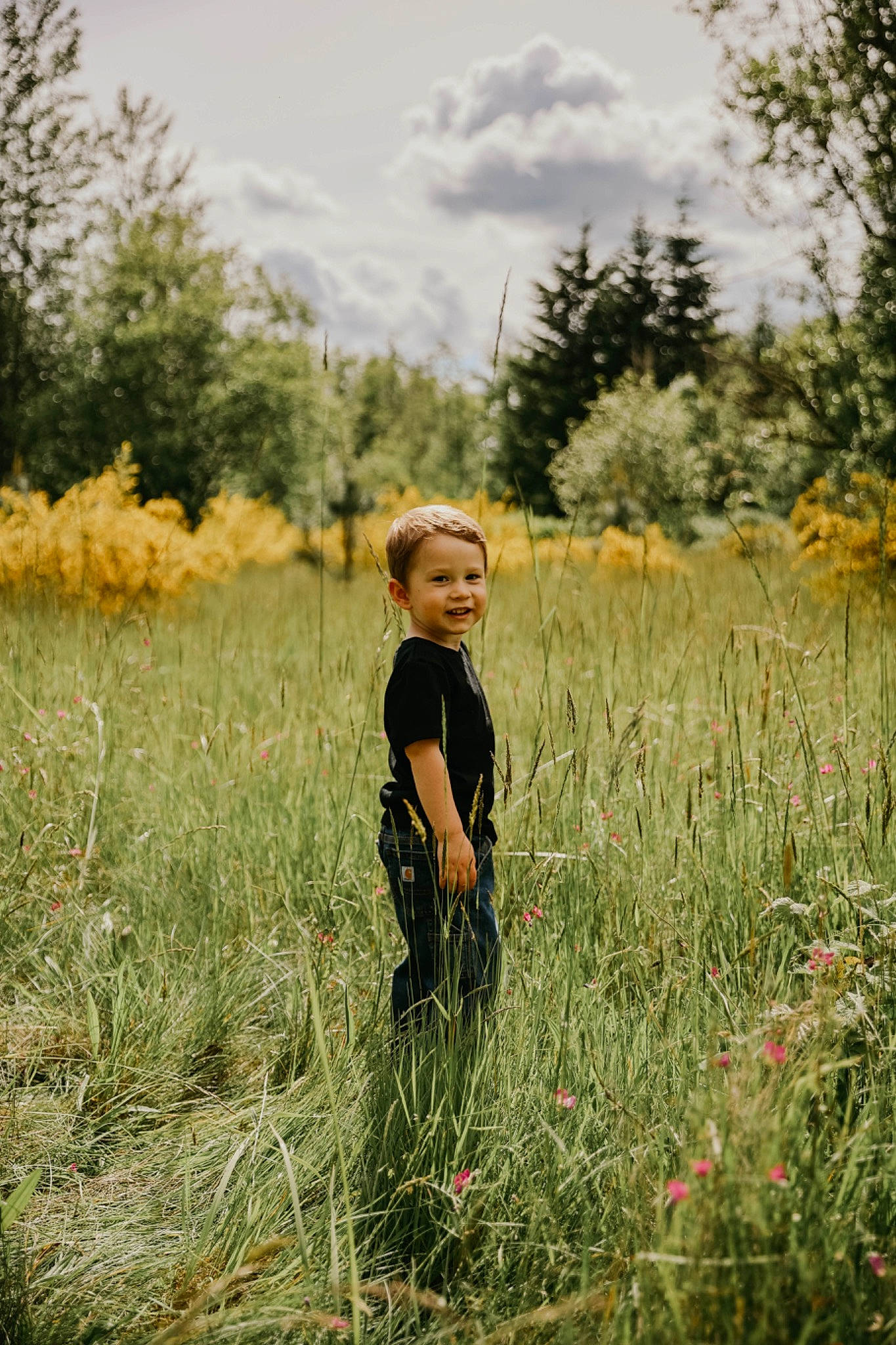 Hunter is registered to the contest to win money with this photo: agriculture, cloud, flash_photography, flower, grass, grass_family, grassland, happy, joy, landscape, meadow, natural_landscape, people_in_nature, person, plain, plant, rural_area, sky, summer, sunlight