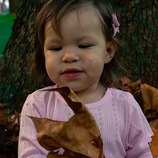 Iris joined the competition — help win amazing prizes! bodypart, child, clothing, face, female, finger, girl, hand, happy, head, knitwear, leaf, longsleeve, person, photography, plant, portrait, smile, sweater, tree