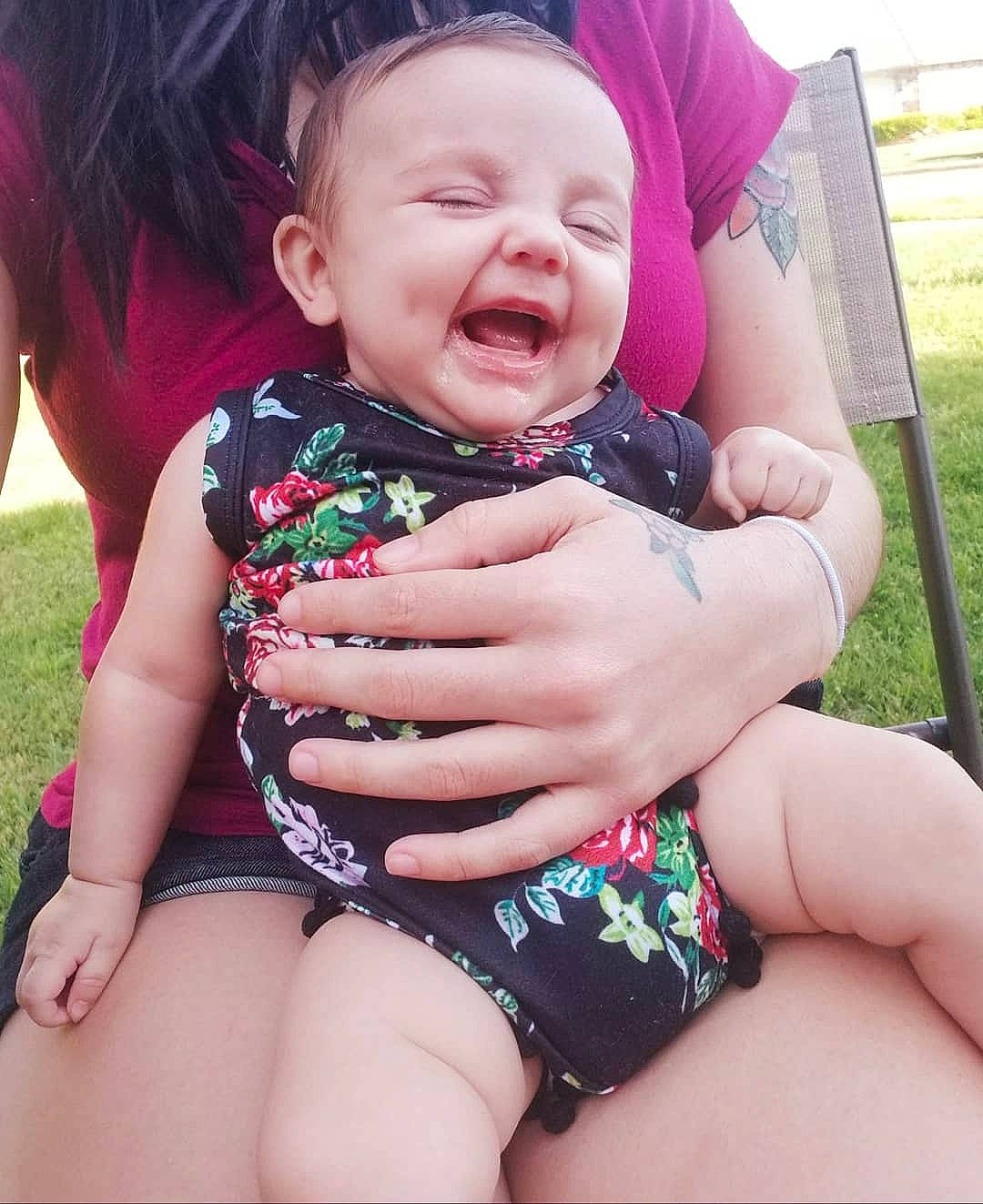 Selina joined the competition — help win amazing prizes! baby, beauty, cheek, child, eye, face, facial_expression, fun, grass, hand, happy, head, leg, person, pink, product, skin, smile, summer, thigh