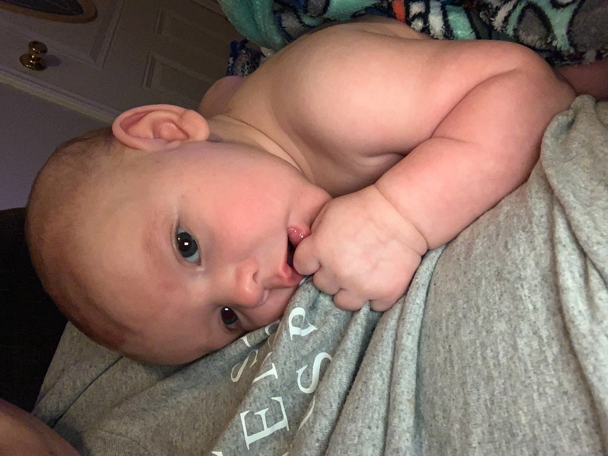 Markus is registered to the contest to win money with this photo: arm, baby, cheek, chest, comfort, ear, eye, eyebrow, finger, forehead, gesture, human_body, iris, lip, mouth, neck, nose, person, skin, thumb