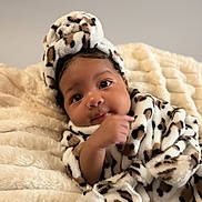 Dynastii joined the competition — help win amazing prizes! adorable, baby, blanket, child, cozy, curious, cute, expression, face, headwrap, indoors, infant, leopard_print, lying_down, portrait, skin, small_hand, soft_texture, warm_clothing, young