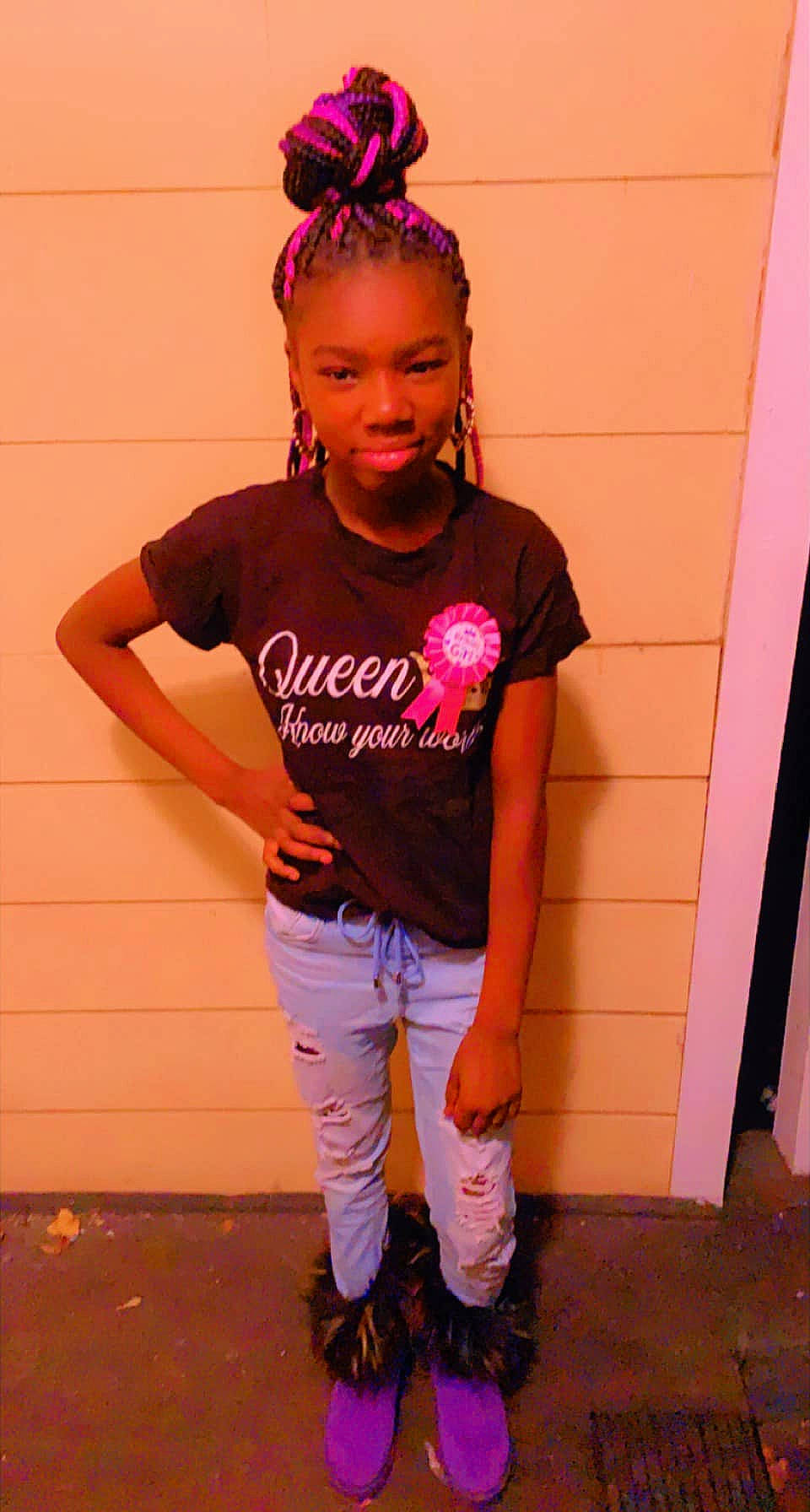 Kaneesha is registered to the contest to win money with this photo: black_hair, boot, denim, face, fashion_design, fun, hair, hairstyle, happy, jewellery, magenta, person, pink, sleeve, sportswear, standing, street_fashion, t_shirt, thigh, toddler