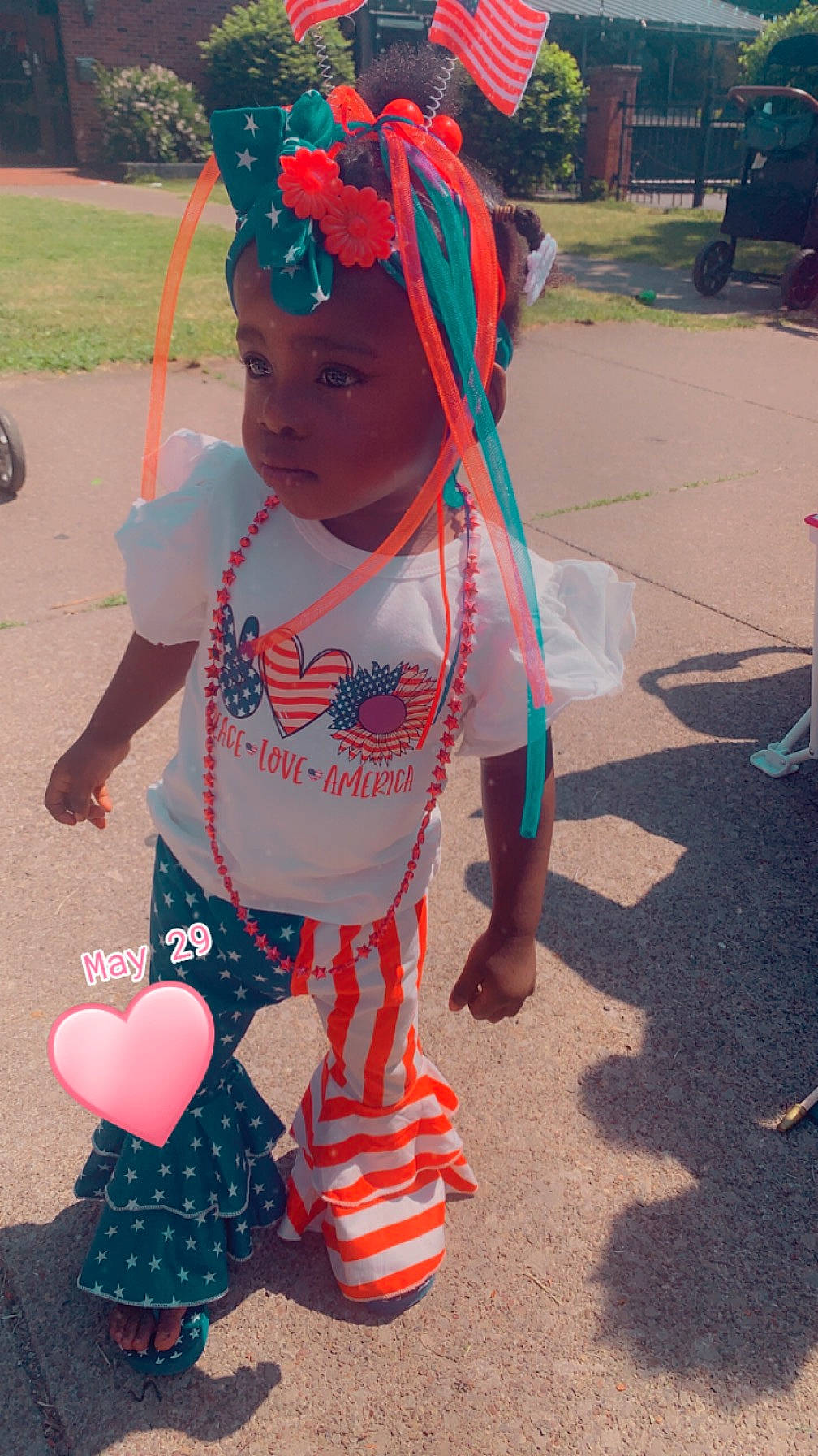 Amani Pamala-lee joined the competition — help win amazing prizes! baby, baby_toddler_clothing, child, costume, event, eyewear, fashion_accessory, fun, grass, happy, headwear, holiday, leisure, magenta, party_supply, pattern, person, personal_protective_equipment, pink, play