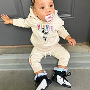 Journee joined the competition — help win amazing prizes! toddler, child, pacifier, hoodie, minnie_mouse, curly_hair, beads, puffs, sneakers, socks, doorstep, concrete, clothing, cute, casual, outdoor, person, baby, fashion, young_child