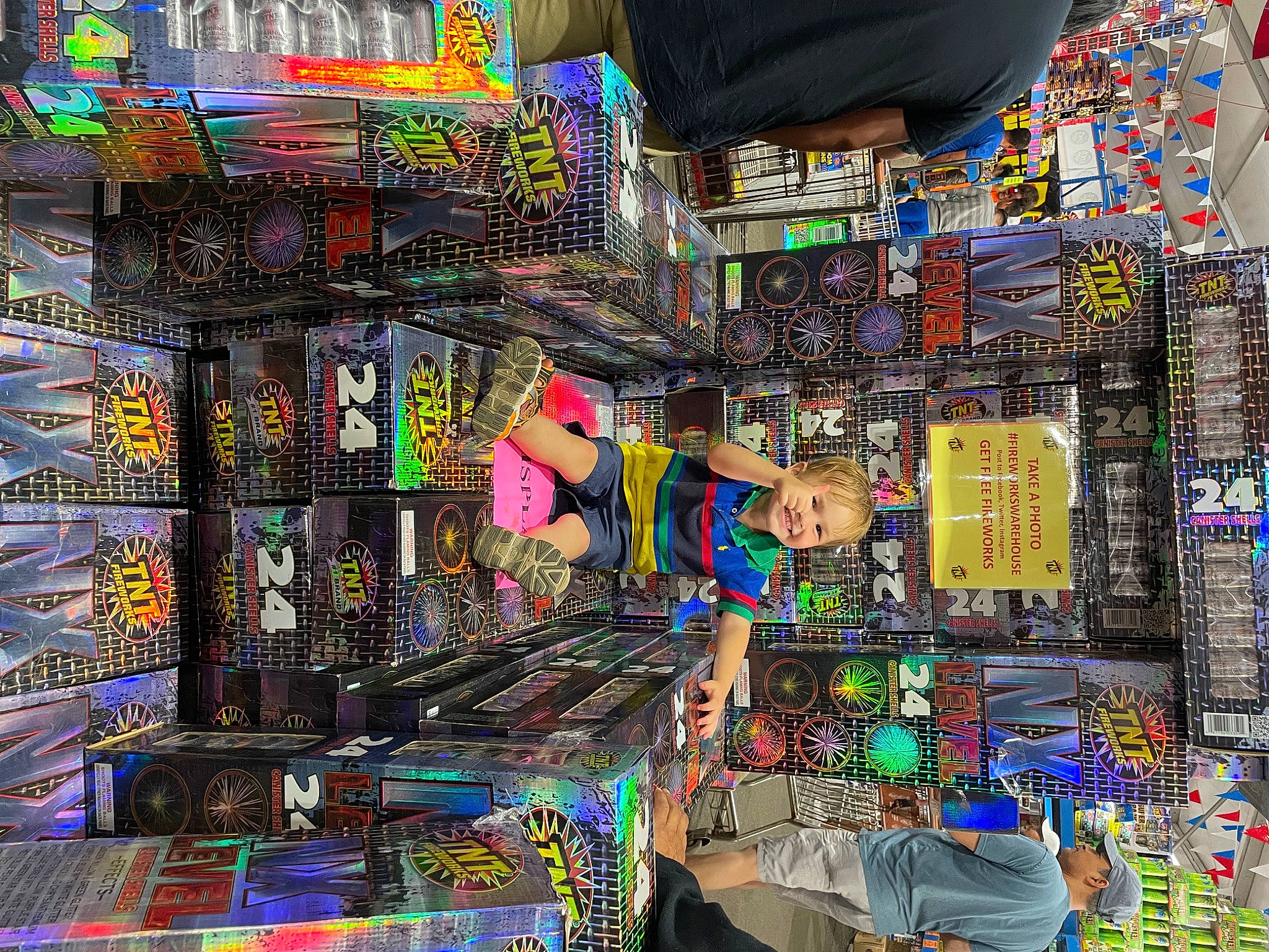 Beau is registered to the contest to win money with this photo: art, bazaar, city, collection, convenience_store, electronic_device, games, headwear, human_settlement, joy, machine, market, marketplace, metropolis, person, plastic, retail, selling, souvenir, street