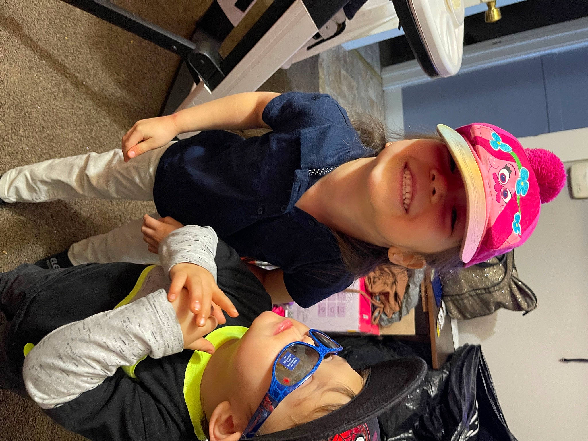 Luisa joined the competition — help win amazing prizes! bag, child, clothing, event, fun, hat, headwear, human_leg, joy, knee, lap, leisure, luggage_and_bags, person, recreation, shorts, sitting, smile, t_shirt, thigh