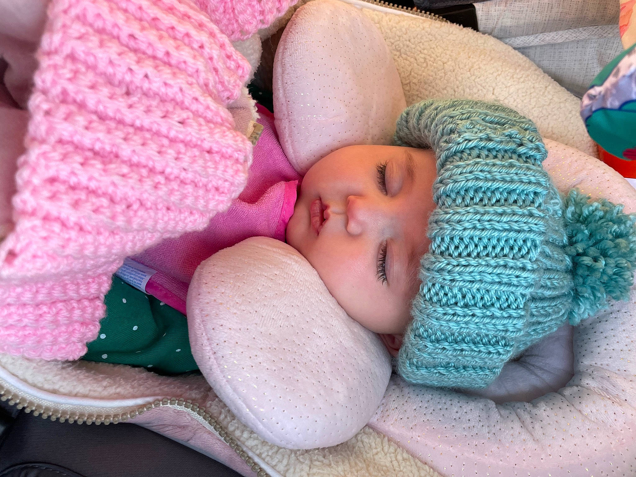 Charli joined the competition — help win amazing prizes! baby, baby_sleeping, baby_toddler_clothing, cap, cheek, chin, comfort, head, headgear, headwear, knit_cap, linens, lip, mouth, person, pink, purple, skin, textile, toddler