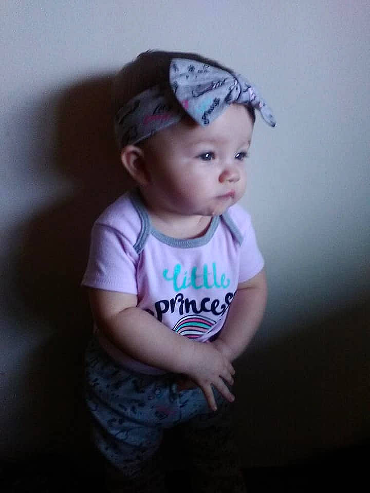 Cierra is registered to the contest to win money with this photo: baby, cheek, child, child_model, cool, forehead, fun, hair_accessory, head, headband, headgear, headpiece, person, photography, pink, product, purple, skin, smile, t_shirt