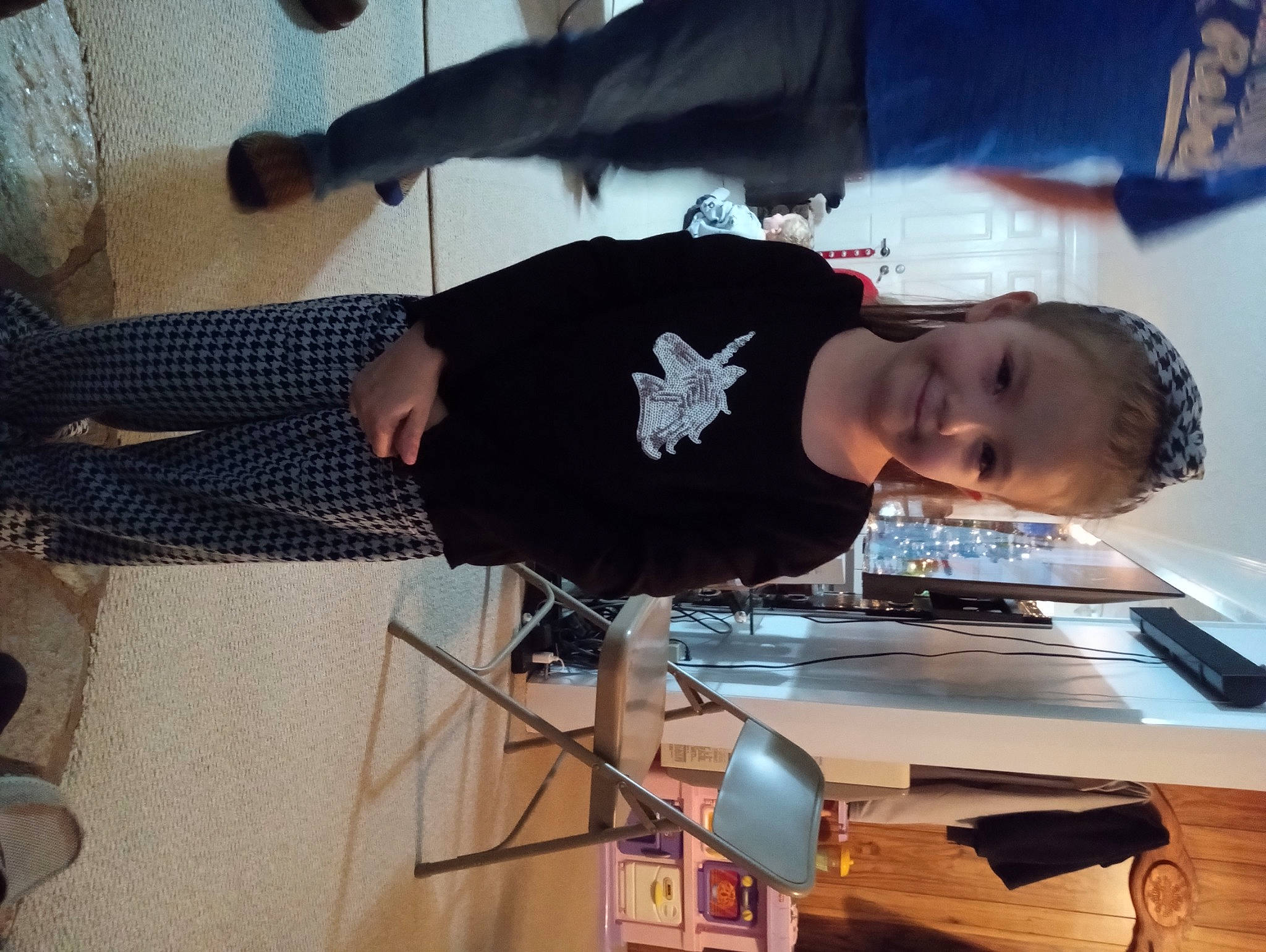 Cierra is registered to the contest to win money with this photo: child, elbow, engineering, fun, joy, person, room, sleeve, t_shirt, table, wrist