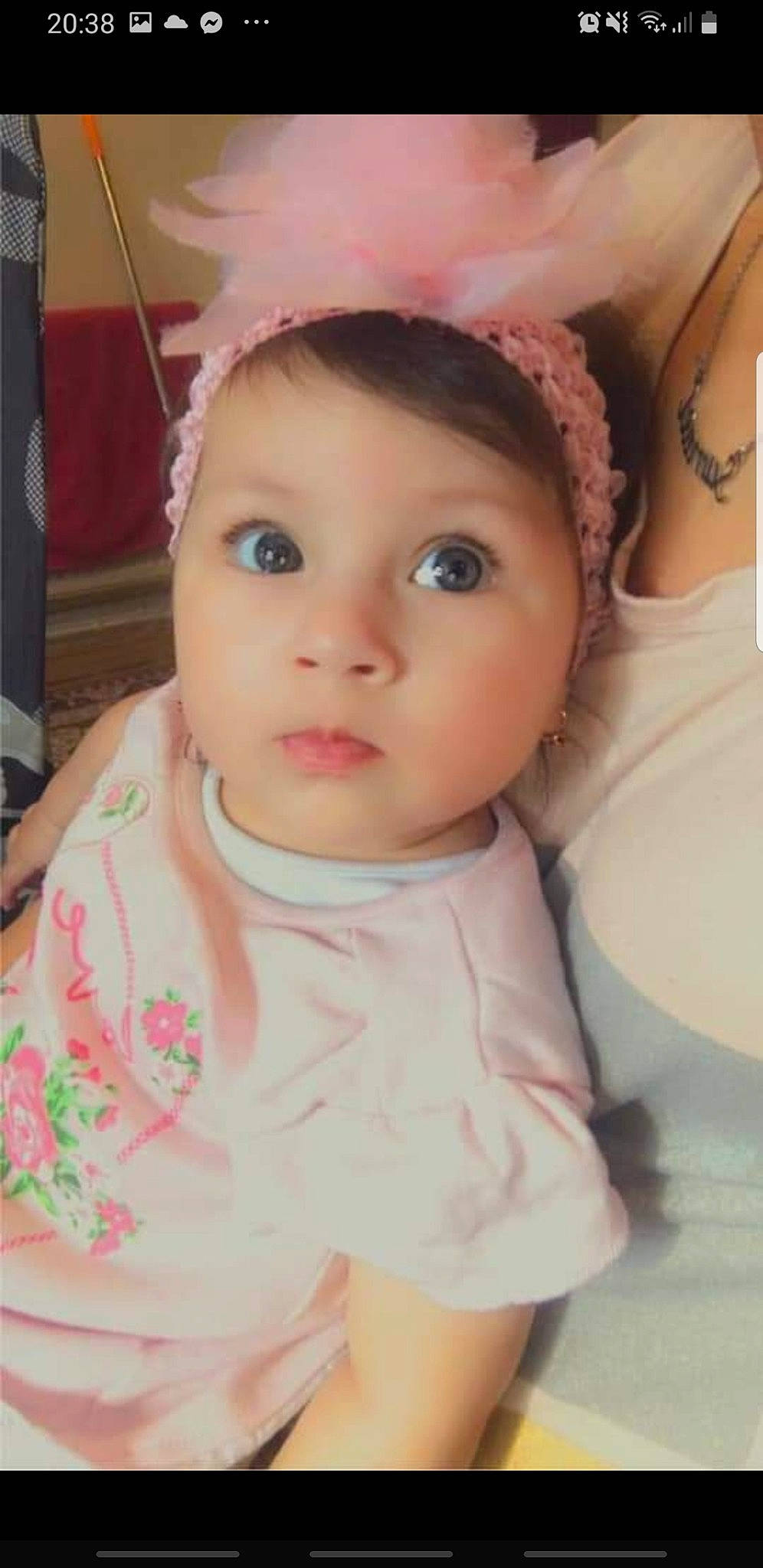 Selina is registered to the contest to win money with this photo: baby_toddler_clothing, cap, cheek, chin, costume_hat, dress, ear, eye, eyebrow, eyelash, face, headgear, helmet, lip, nose, person, pink, skin, sleeve, sun_hat