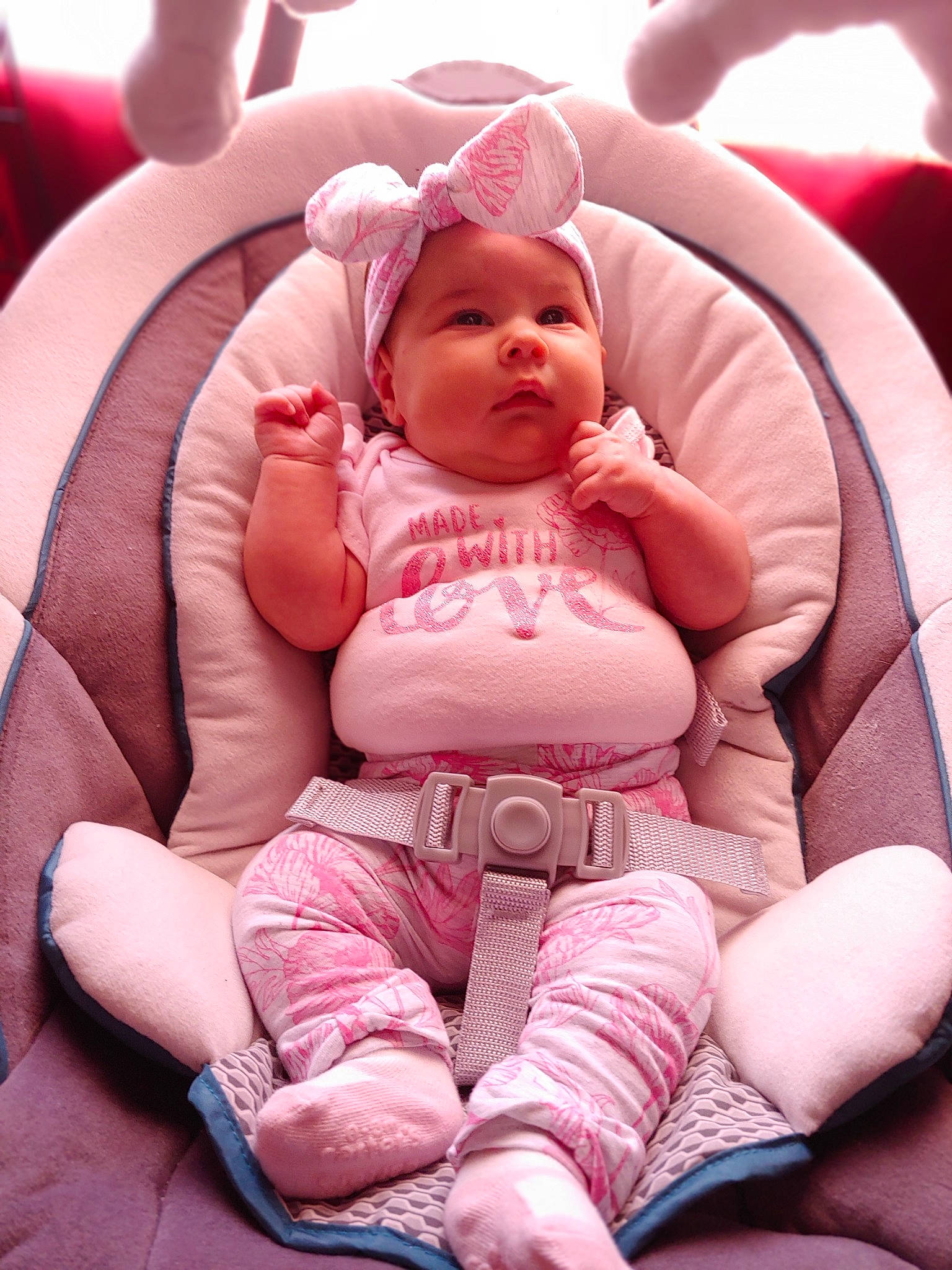 Emmalina is registered to the contest to win money with this photo: baby, baby_in_car_seat, birth, car_seat, cheek, child, headwear, person, pink, product, skin, smile, toddler