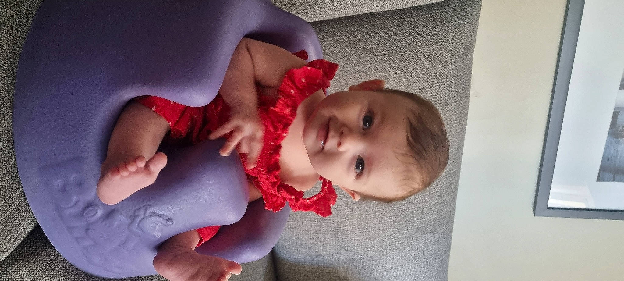 Amara is registered to the contest to win money with this photo: arm, baby, baby_toddler_clothing, cheek, child, comfort, eyelash, facial_expression, finger, fun, gesture, hand, happy, lip, mouth, nail, nose, person, skin, smile