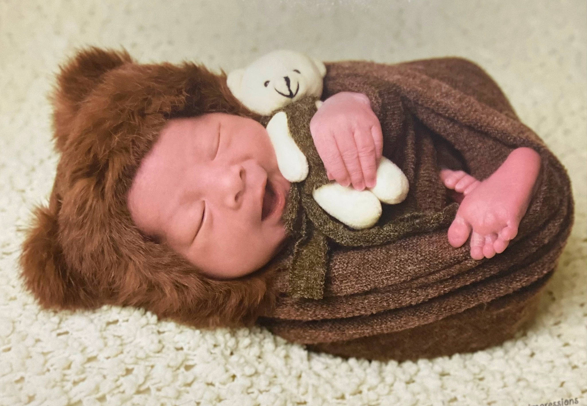 Francisco joined the competition — help win amazing prizes! art, baby_sleeping, baby_toddler_clothing, brown, child, comfort, creative_arts, fur, headgear, knit_cap, linens, pattern, person, smile, stuffed_toy, teddy_bear, textile, toy, wood, wool