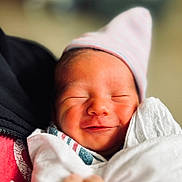 Alexander joined the competition — help win amazing prizes! newborn, baby, smiling, closed_eyes, hat, blanket, wrapped, soft_light, close_up, infant, peaceful, cute, sleeping, portrait, skin, human, headwear, comfort, warm, indoors