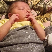 Kaylee joined the competition — help win amazing prizes! newborn, baby, sleeping, blanket, fabric, pattern, hands, face, resting, cozy, indoor, child, infant, cute, toddler, soft, wrapped, peaceful, portrait, closeup