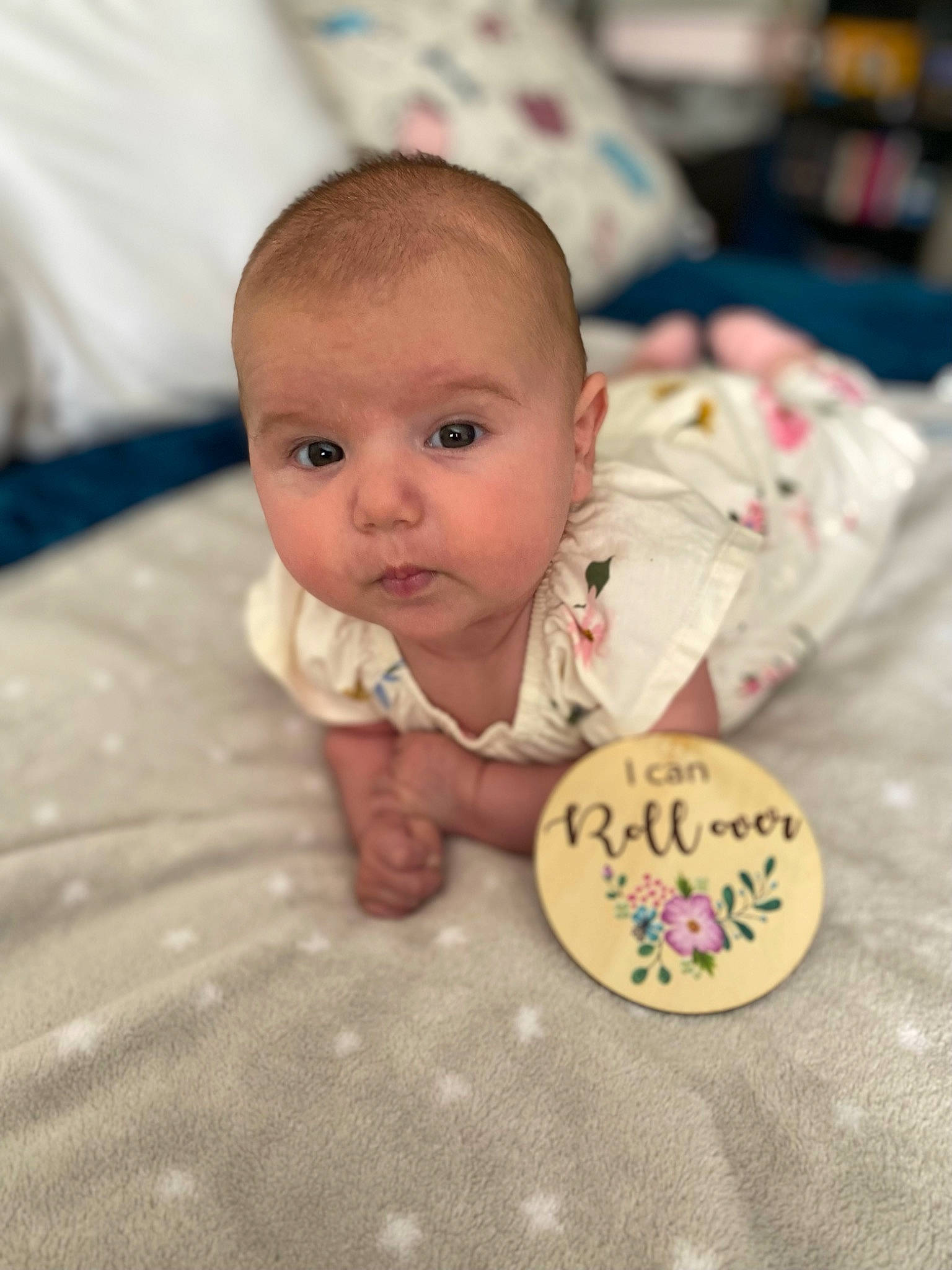 Siren is registered to the contest to win money with this photo: baby, baby_products, baby_toddler_clothing, cheek, child, chin, comfort, eye, flooring, happy, iris, linens, mammal, nose, person, room, skin, textile, toddler, tummy_time