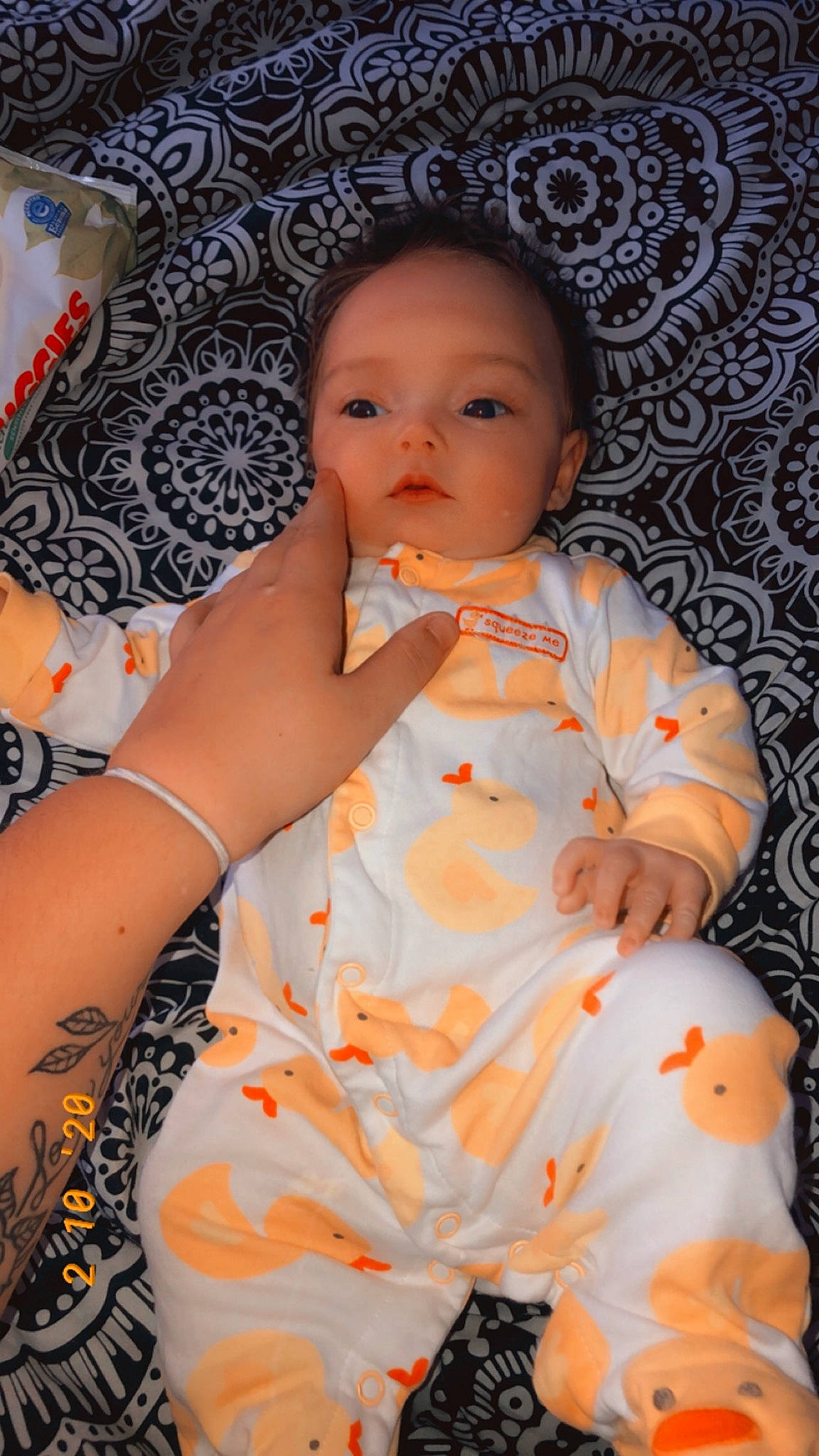Madilynn is registered to the contest to win money with this photo: baby, baby_products, baby_toddler_clothing, cheek, child, finger, orange, person, skin, textile, toddler