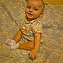 Keyden a rejoint le concours — aidez-le/la à gagner de superbes lots ! baby, candid, child, colorful_shirt, cozy, cute, face, happy, home, indoor, infant, patterned, person, portrait, quilt, sitting, smiling, socks, warm_lighting, young_child
