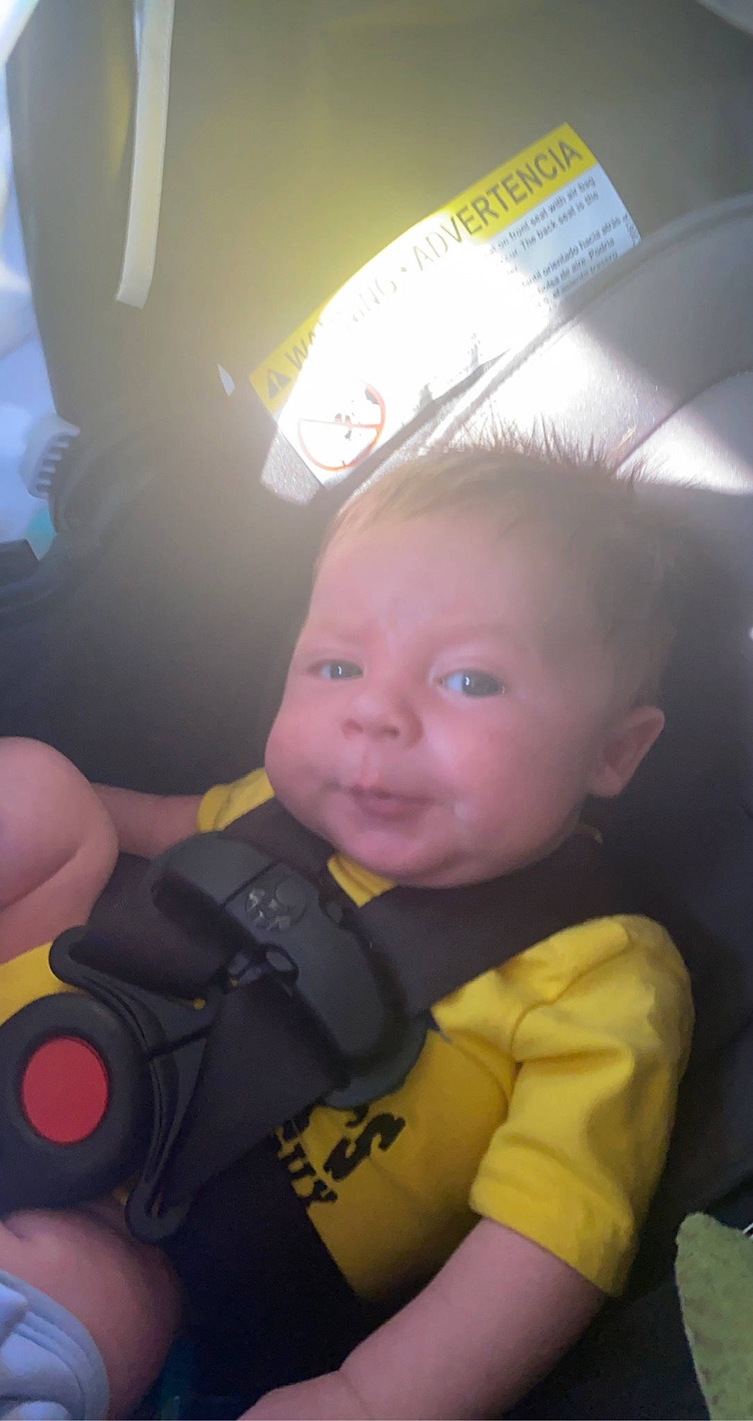 Ashtyn is registered to the contest to win money with this photo: auto_part, baby, baby_toddler_clothing, car_seat, cheek, child, cool, finger, fun, gesture, happy, head, iris, nose, person, personal_protective_equipment, smile, t_shirt, thumb, toddler